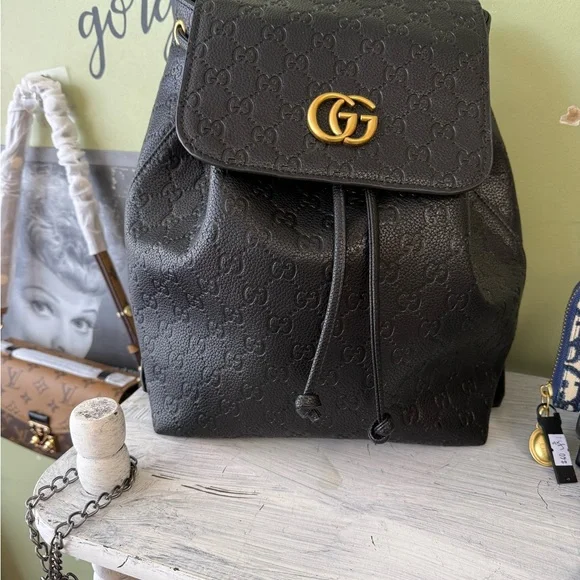 Gucci Black Monogram Backpack with Gold Accents - Picture 1 of 1